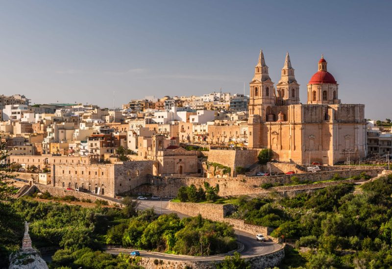 Il-Mellieha, Malta -  Mellieha town at sunny day with Paris Church on hill top.